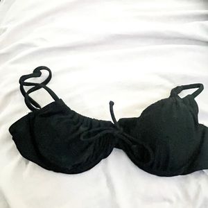 A black comfortable bathing suit top